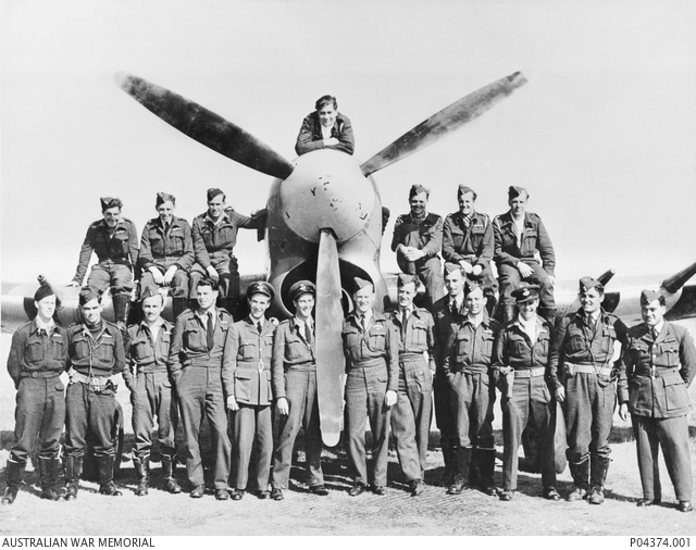 174 Squadron group portrait with George fourth from the left in the back row, at the top.