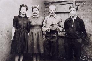 Norbert Fillerin with family members in an archival photograph.