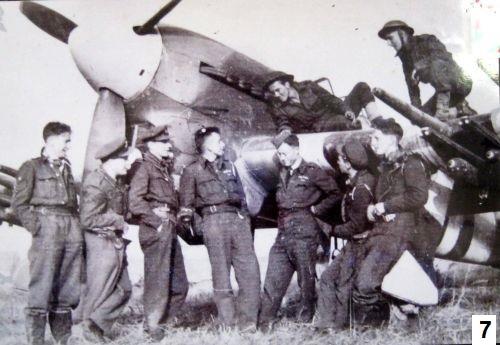 174 Squadron pilots gathered together; George stands second from the left.